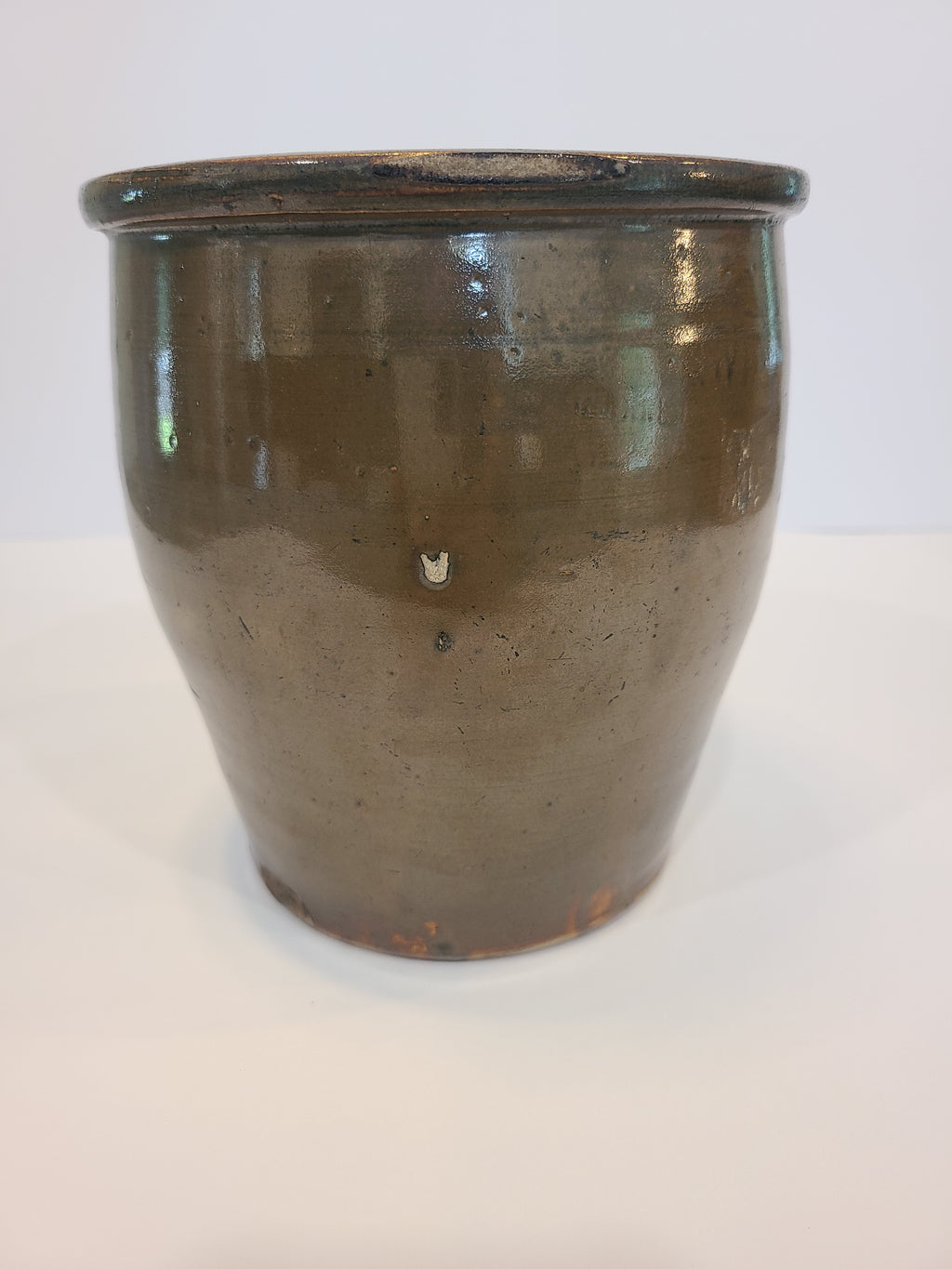 Side view of vintage Handmade Brown Glaze Stoneware Crock