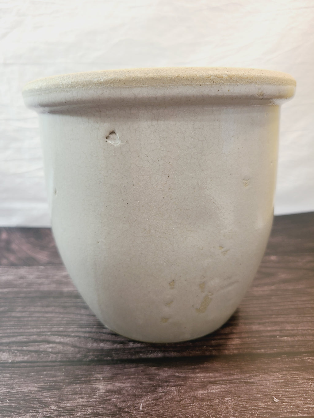 Vintage Handmade White Glazed Crock showing slight imperfection in glaze.