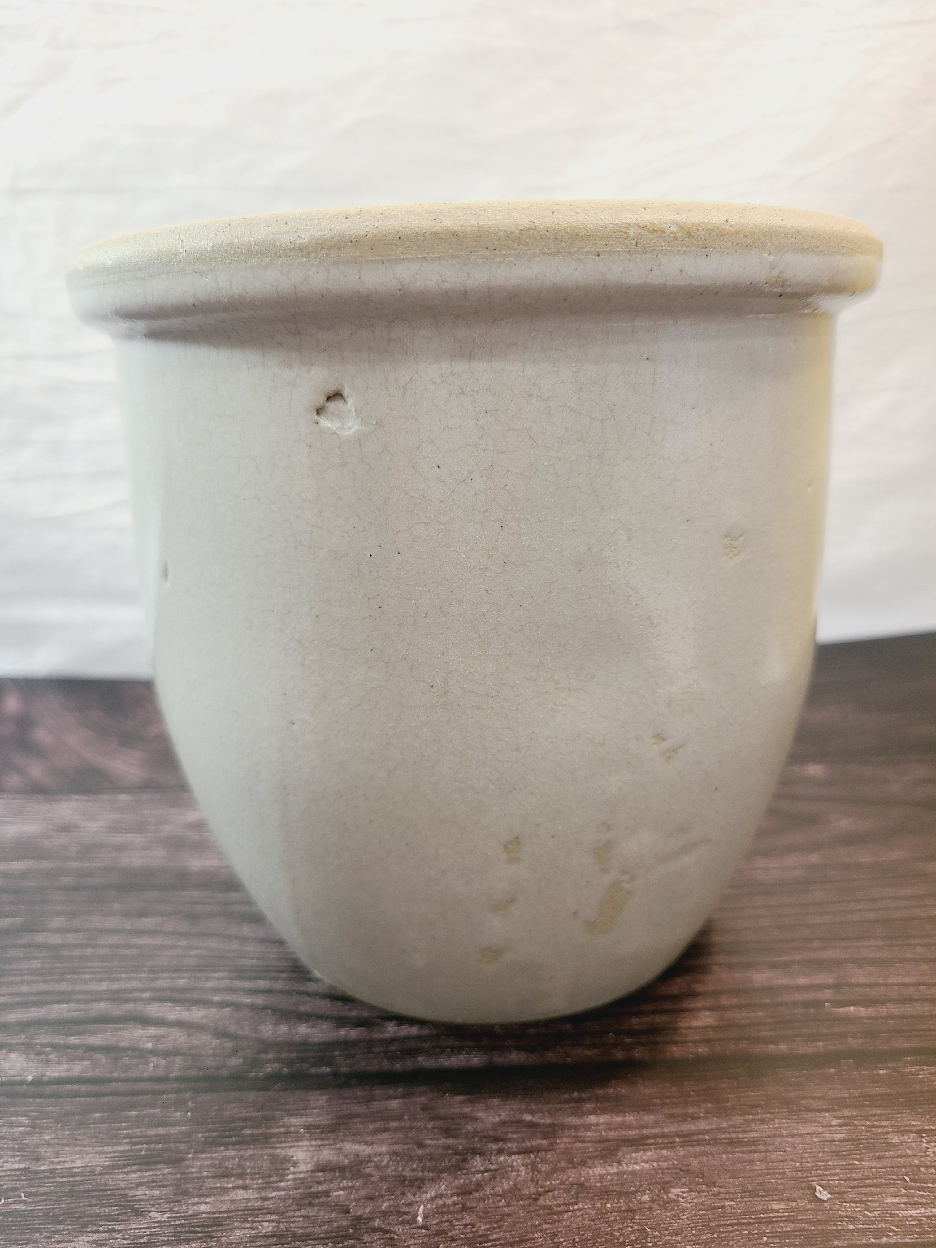 Vintage Handmade White Glazed Crock showing slight imperfection in glaze.
