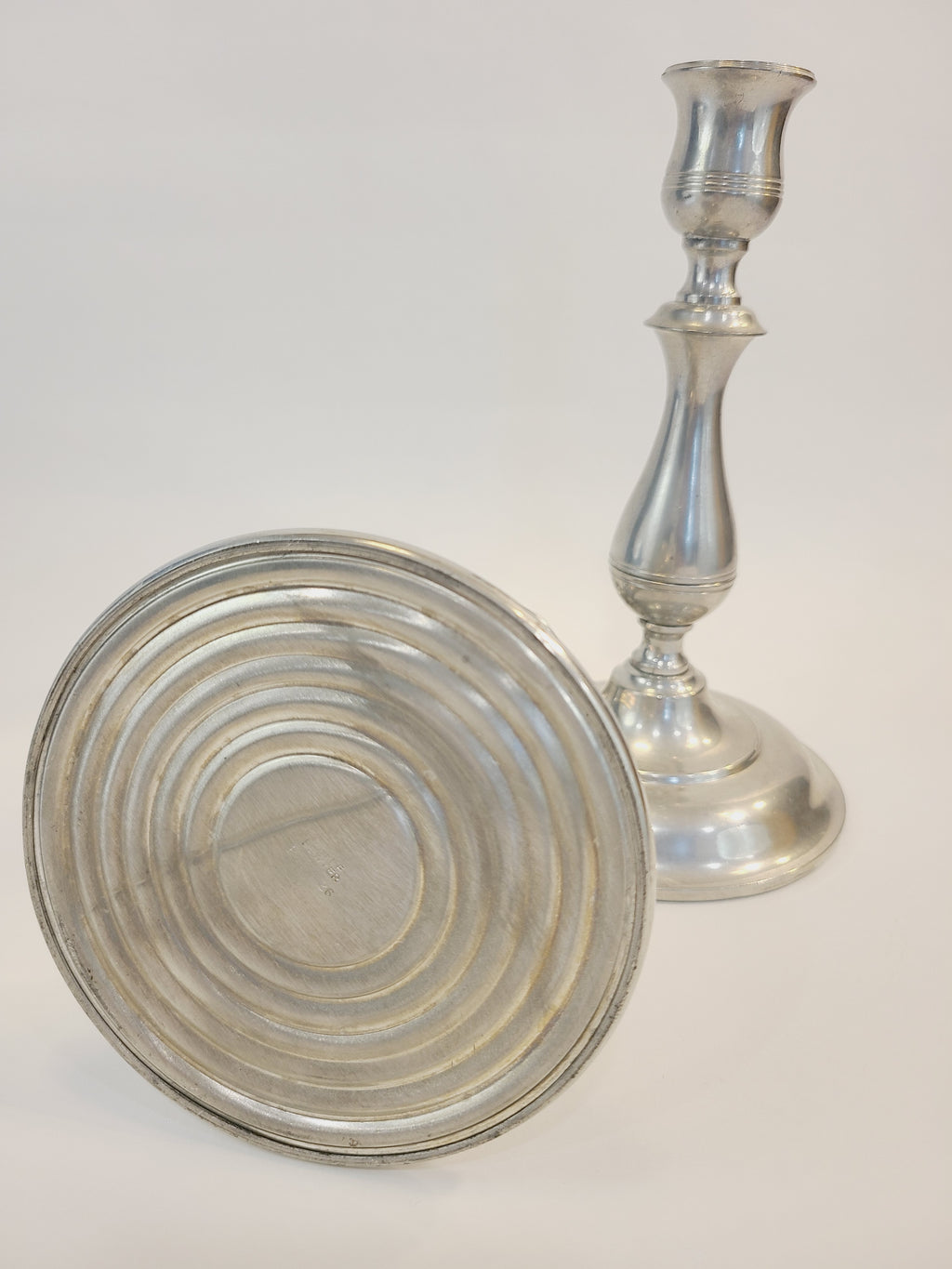 Bottom of vintage Stieff Pewter Candle holders.