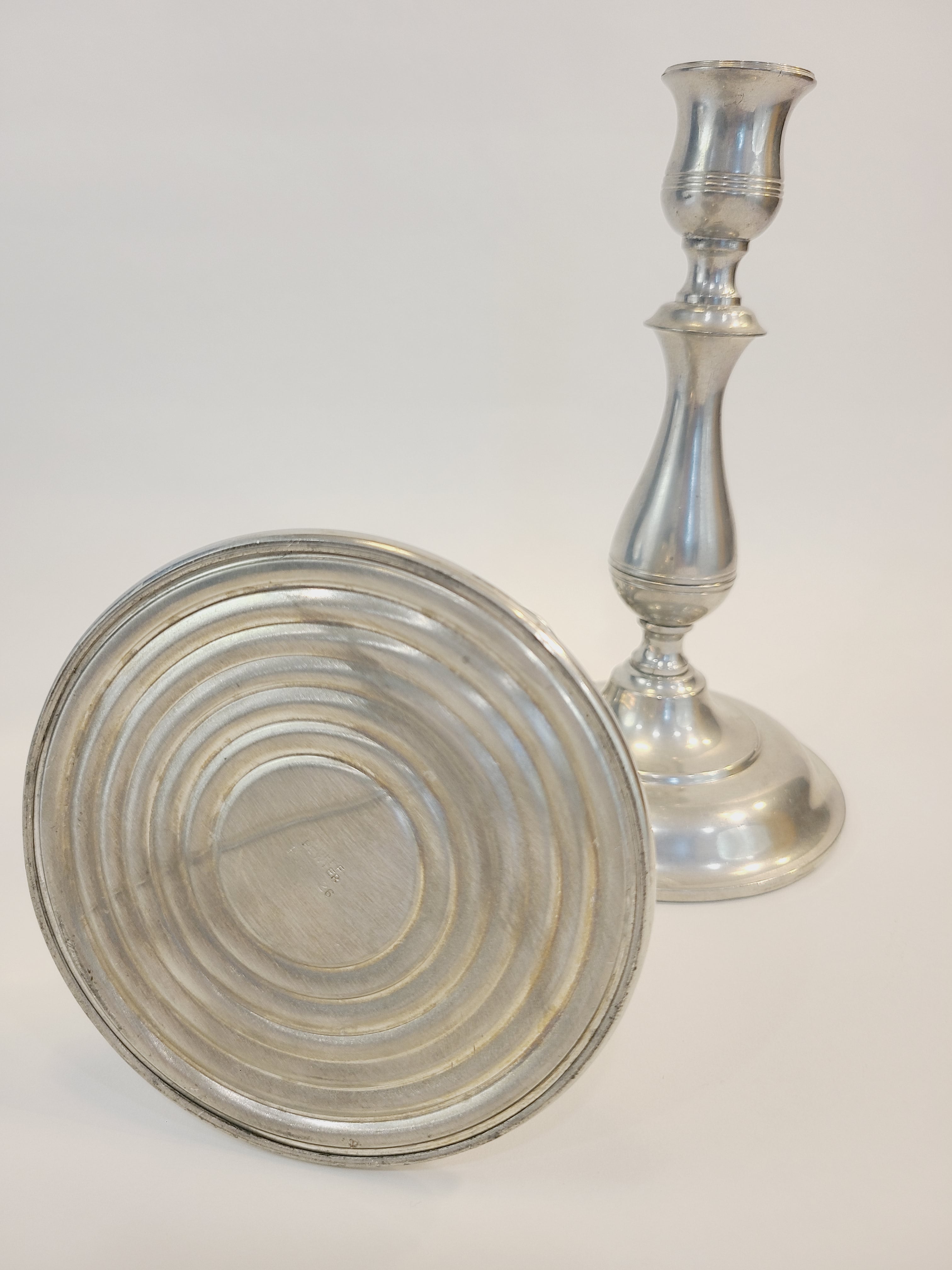 Bottom of vintage Stieff Pewter Candle holders.