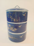 Vintage Fukagawa Seiji 3-Tier Stacking Bowl Set with Lid in lapis blue with gold accents.
