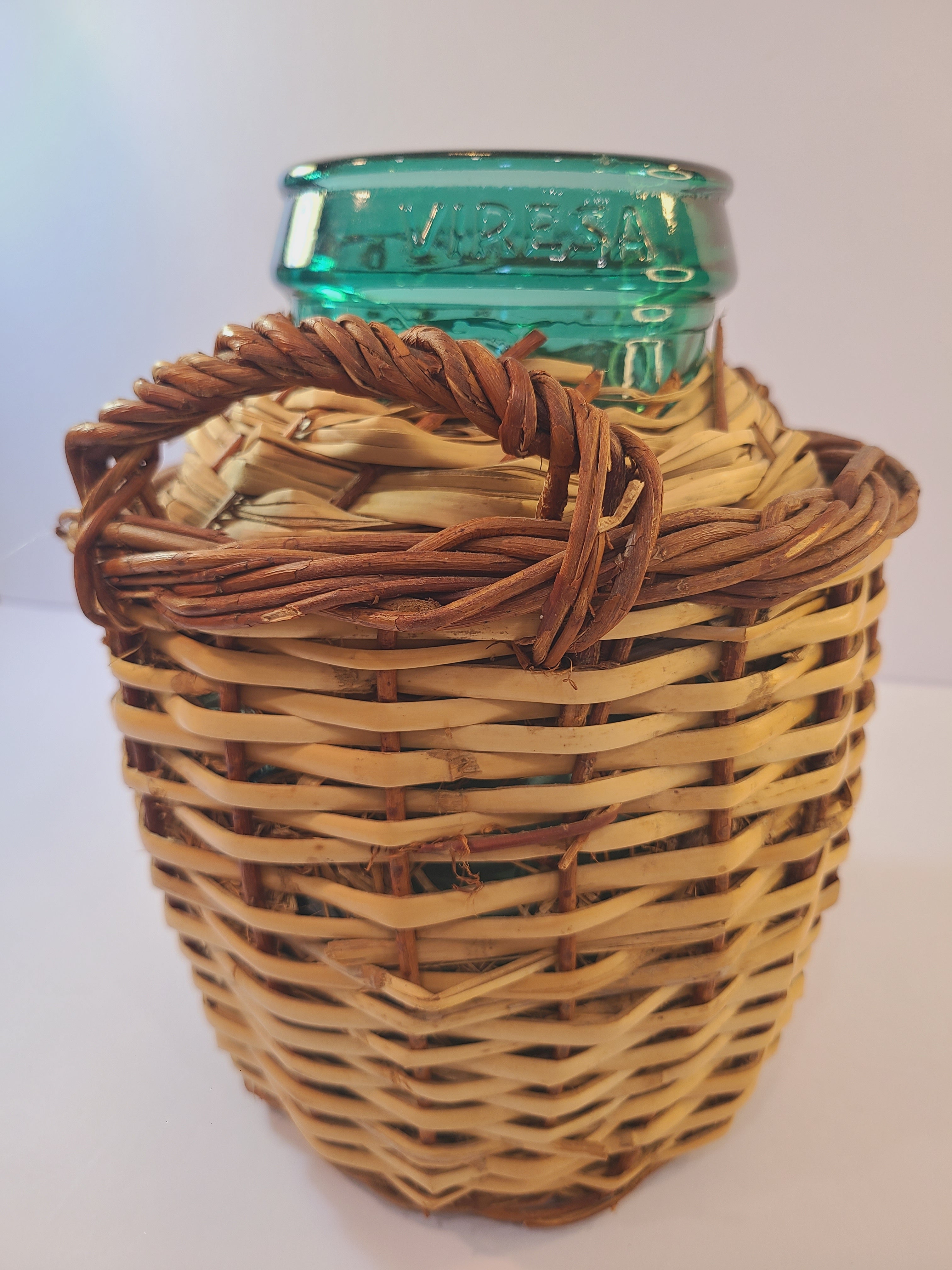 Vintage blue-green Viresa Demijohn with Original Rattan circa 1960s 10.5 inches shown from the side