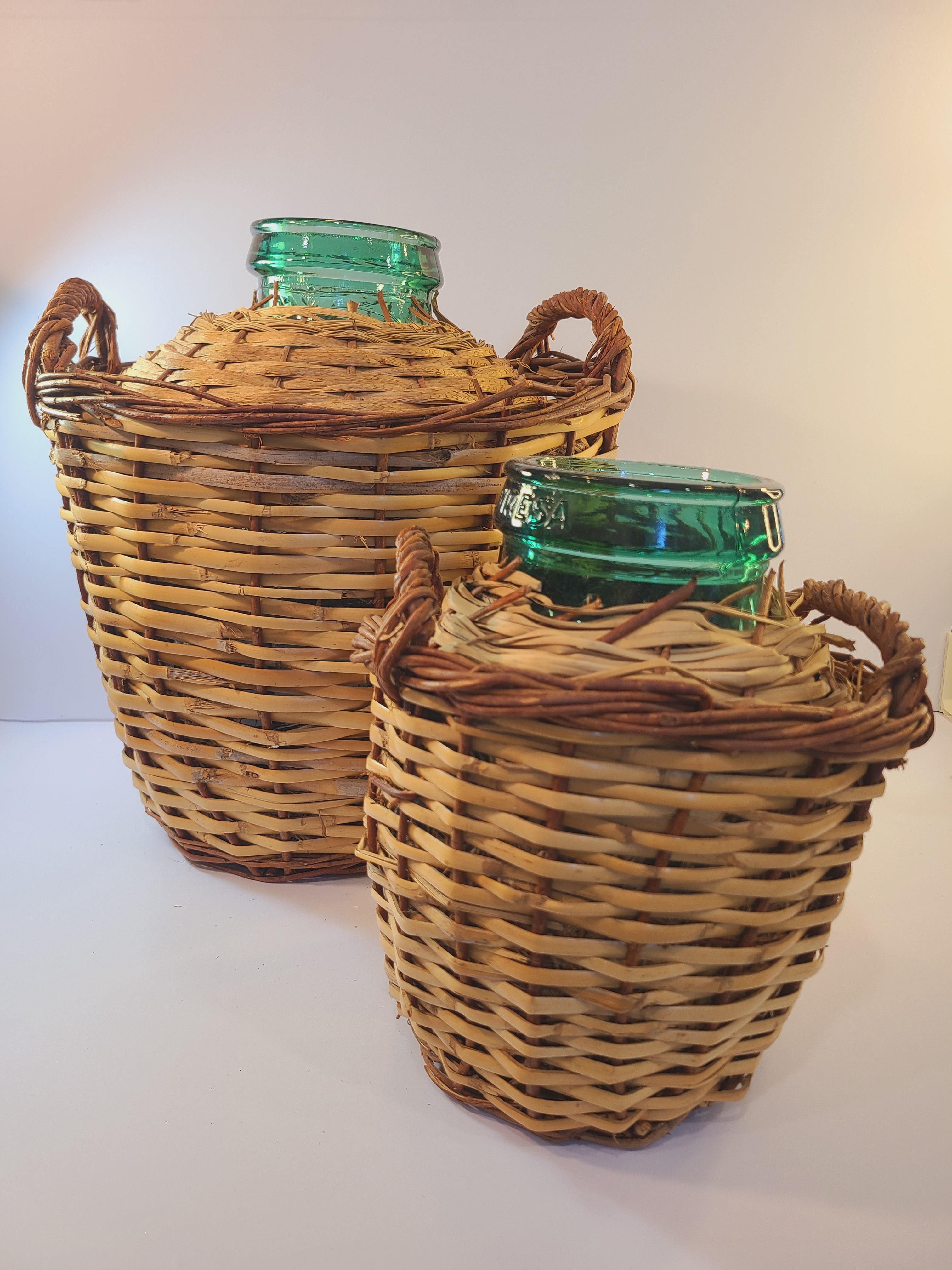 Pair of blue-green Viresa Demijohns with Original Rattan circa 1960s.