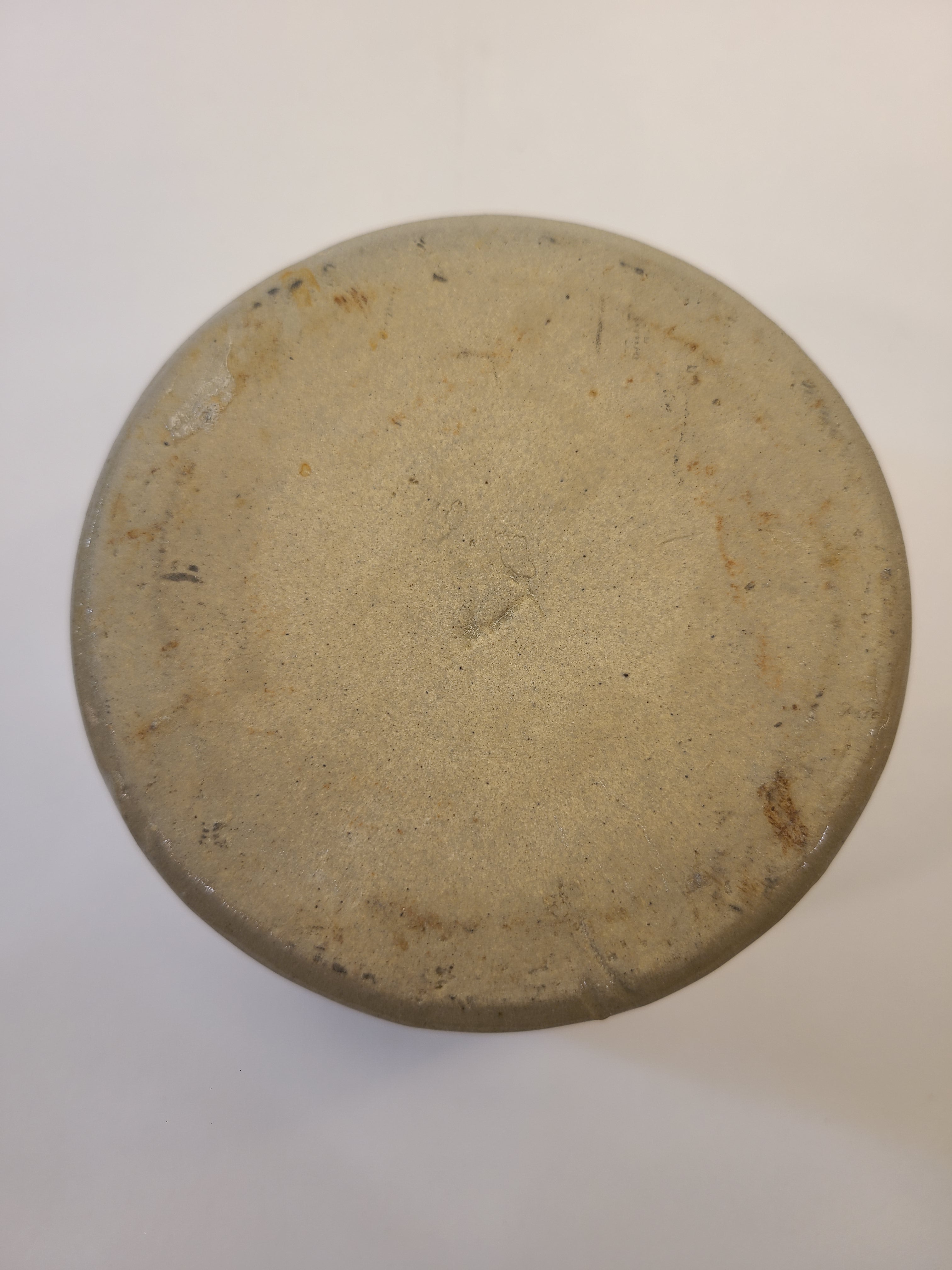 Bottom of petite vintage gray crock.