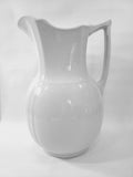 Antique white Alfred Meakin Royal Ironstone Pitcher on white background.