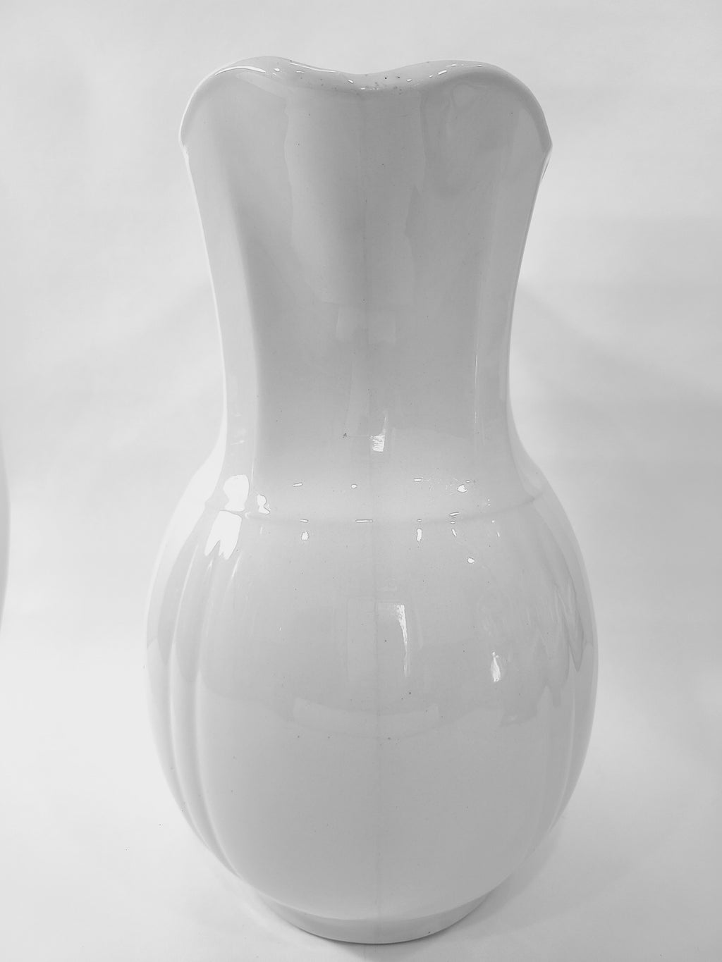 Antique white Alfred Meakin Royal Ironstone Pitcher showing spout.