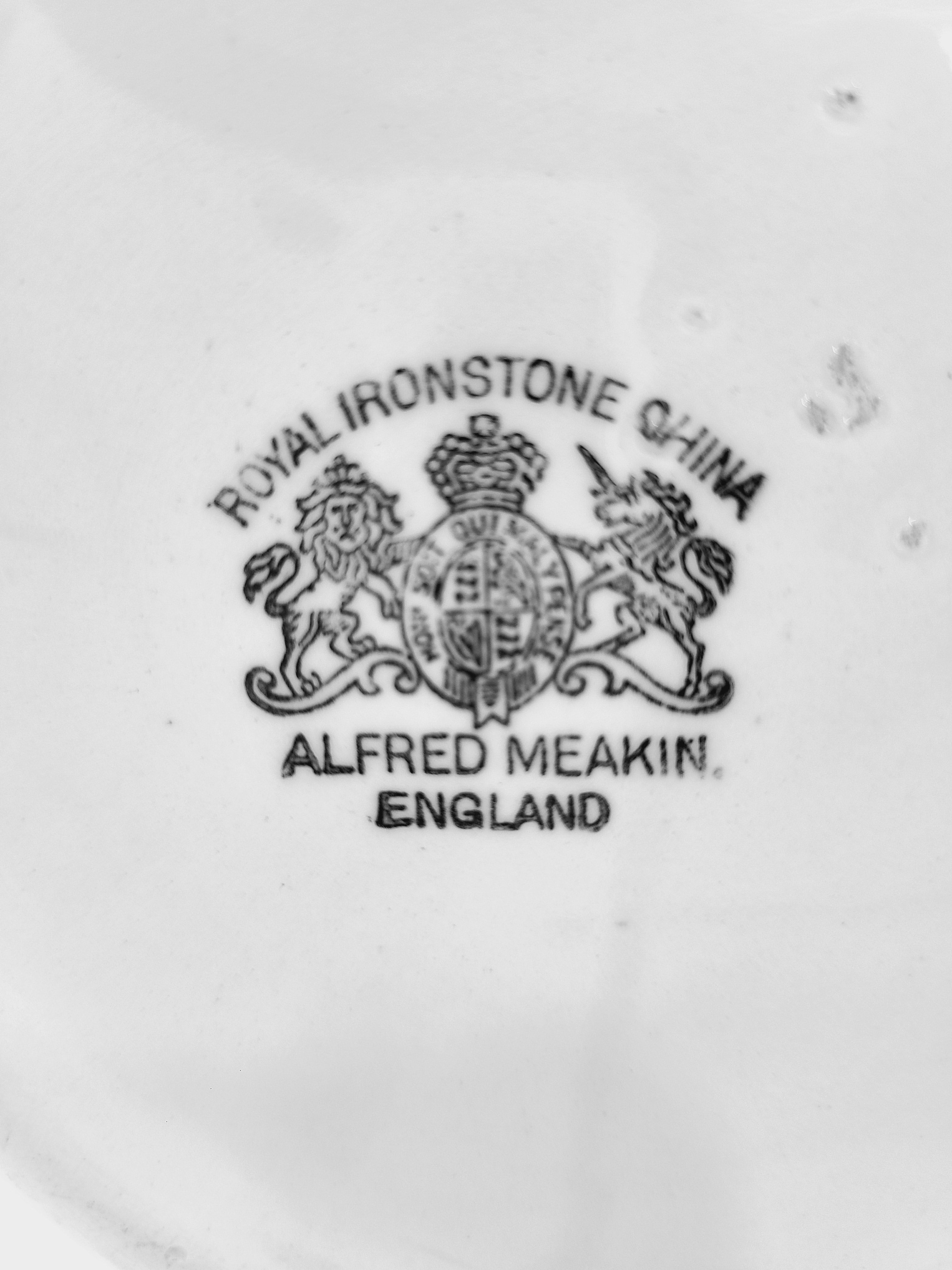 Close up of makers mark on bottom of Antique white Alfred Meakin Royal Ironstone Pitcher.