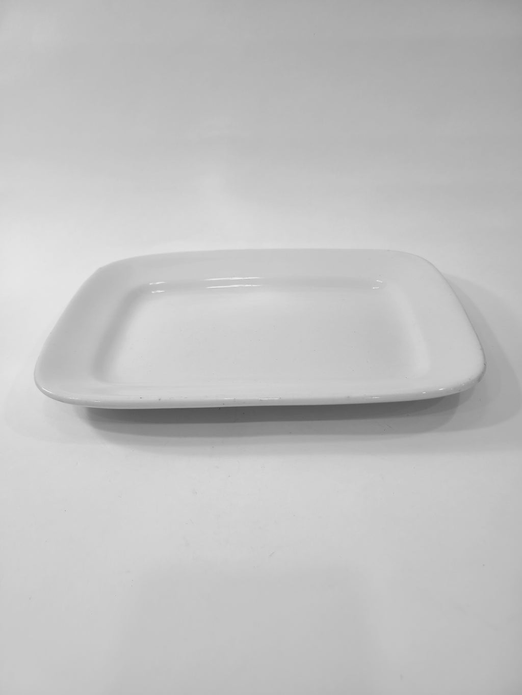Antique white Alfred Meakin Royal Ironstone Platter photographed from the side.