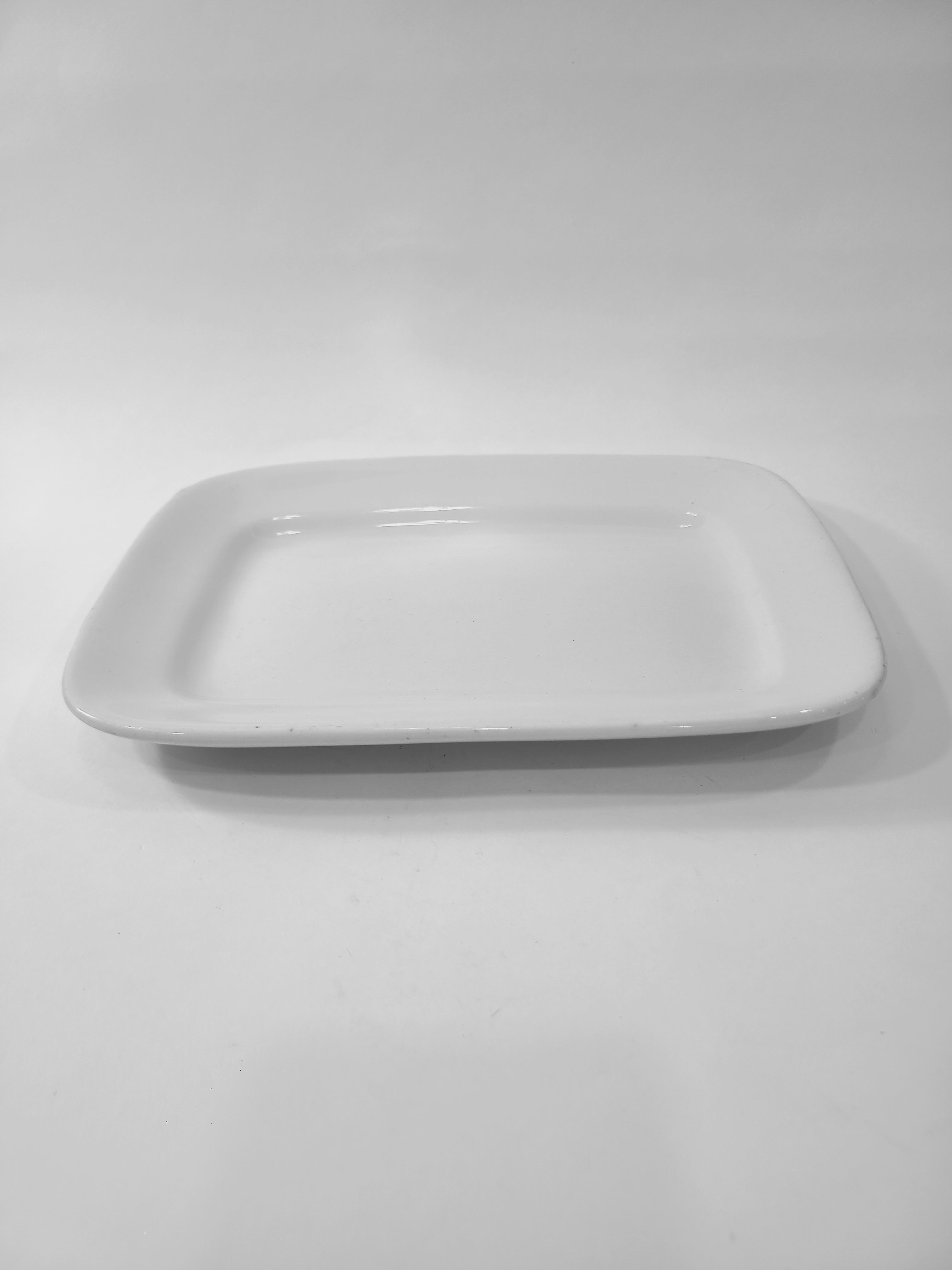 Antique white Alfred Meakin Royal Ironstone Platter photographed from the side.