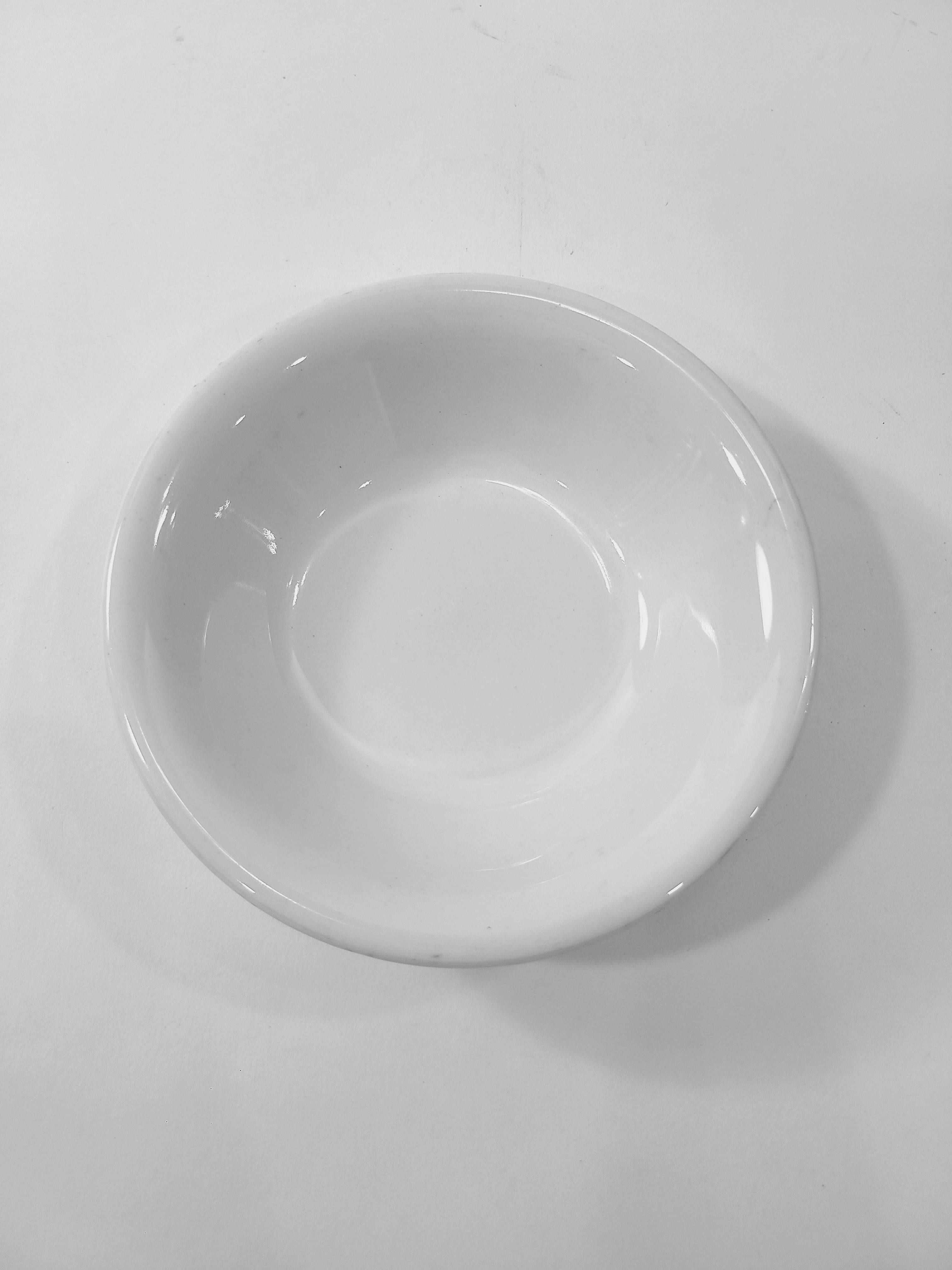 Top view of vintage glossy white Petite Buffalo China Bowl made in USA.