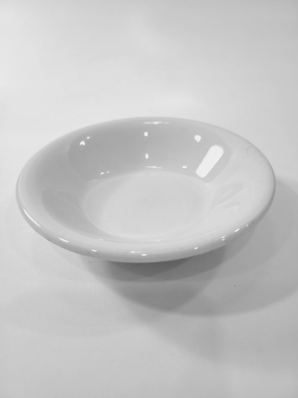Glossy vintage white Petite Buffalo China Bowl made in USA.