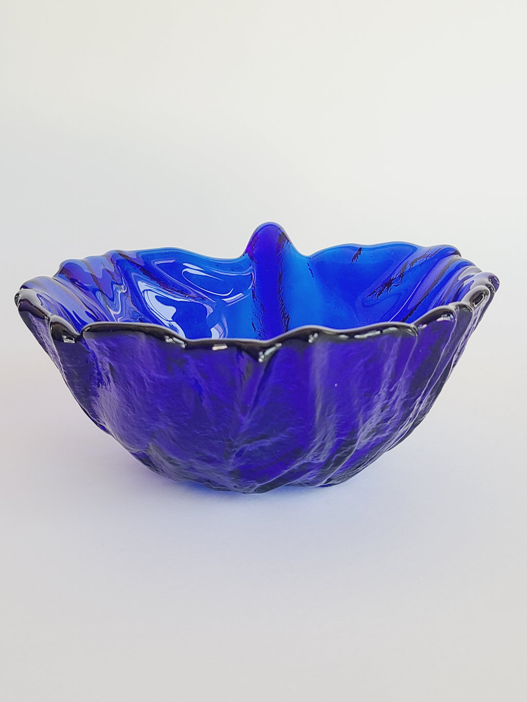 Vintage Blenko Cabbage Pattern Bowl in Cobalt Blue on white background.