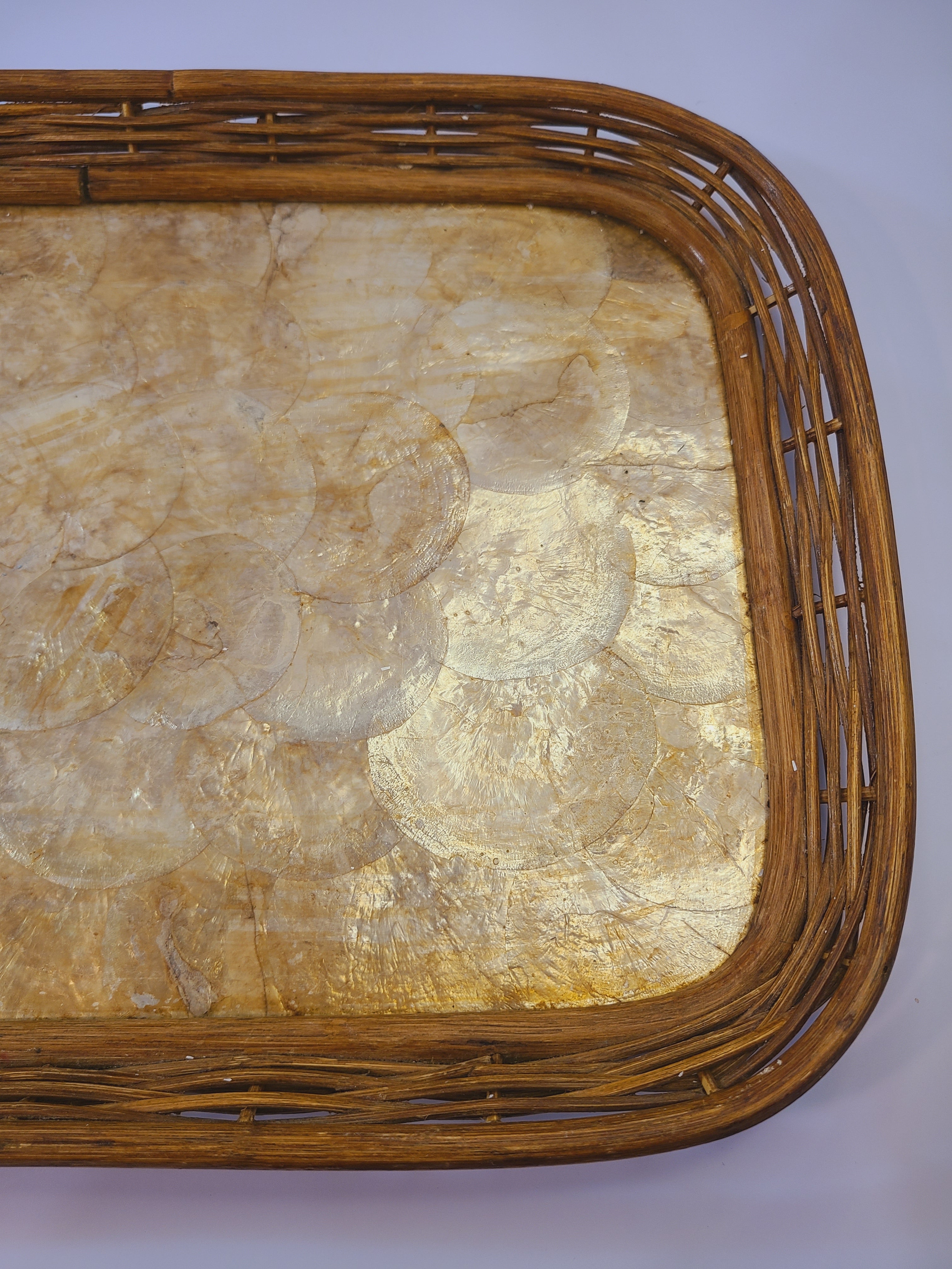 Vintage Capiz Shell Tray with Rattan Border photographed to show glow of capiz shells