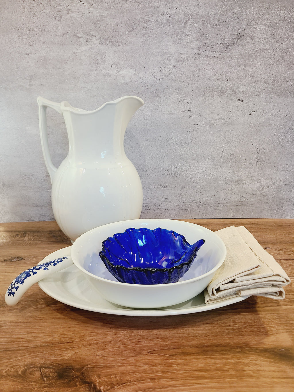 Vintage white porcelain Arzberg Form 1382 Oval Vegetable Bowl by Hermann Gretsch displayed in table setting.