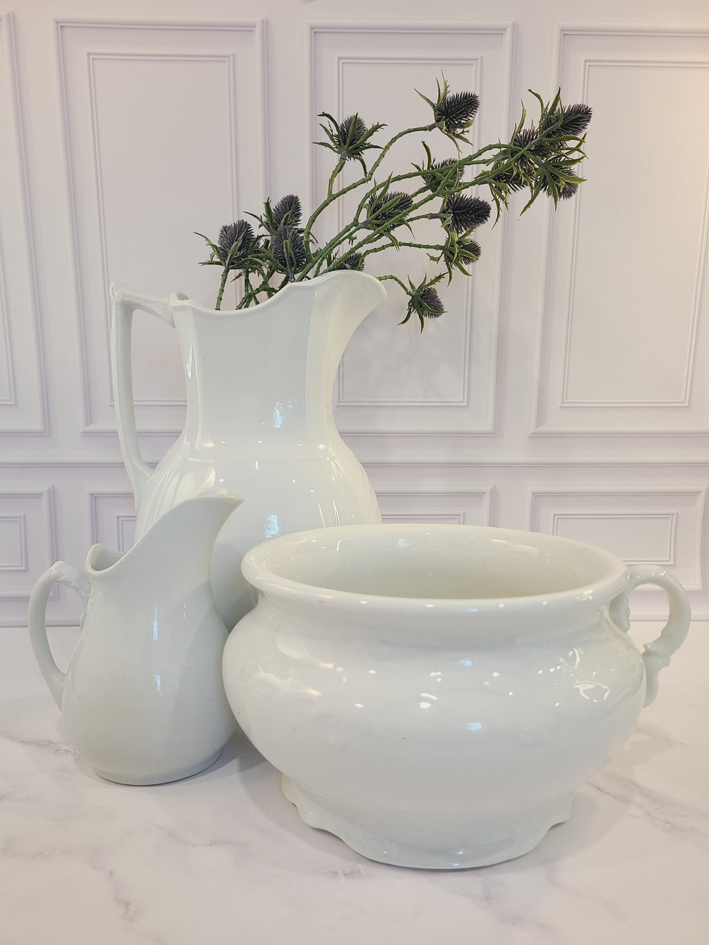 Antique white Mellor, Taylor & Co. English Ironstone Chamber Pot displayed with large and small ironstone pitchers.