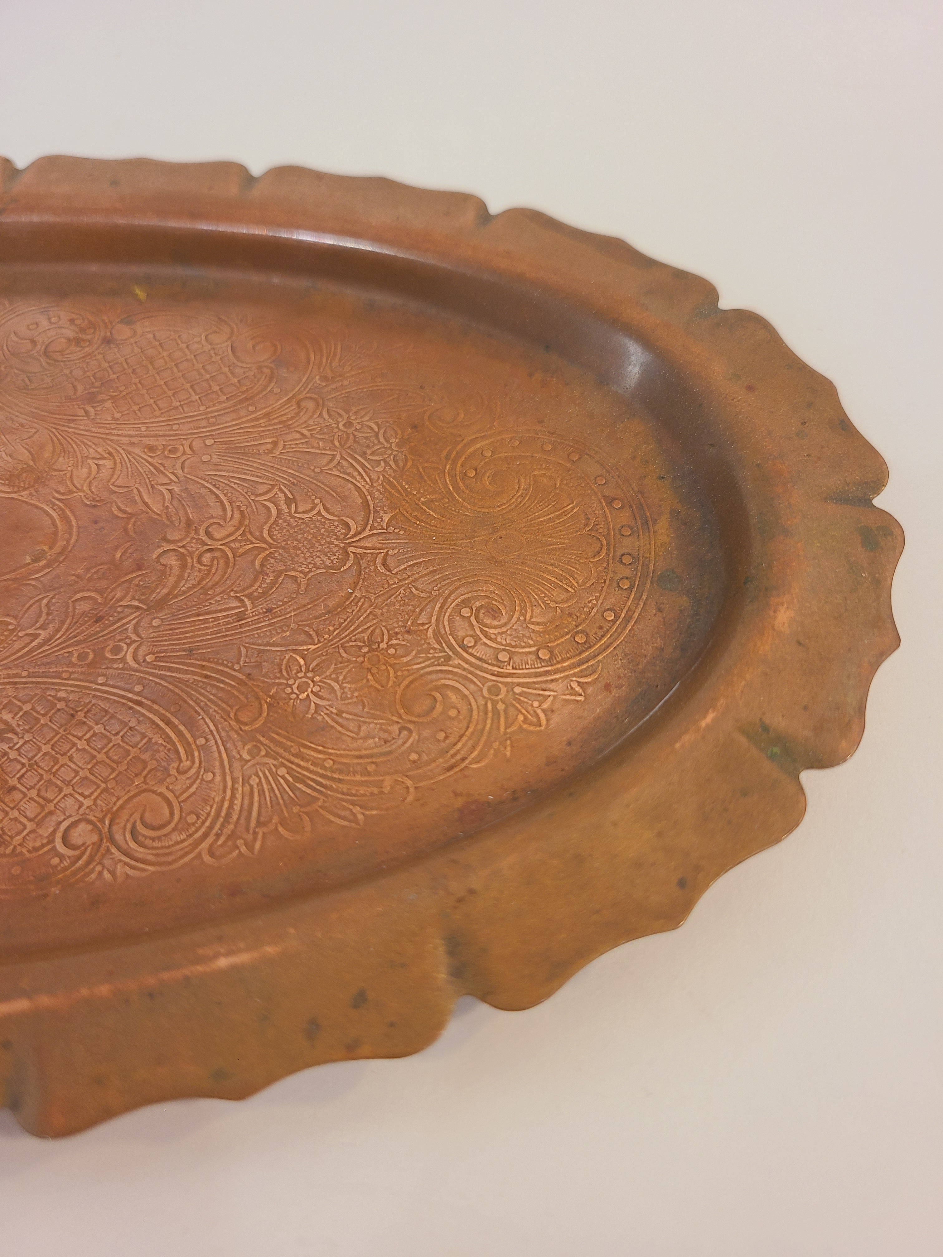 Close up on vintage copper tray.