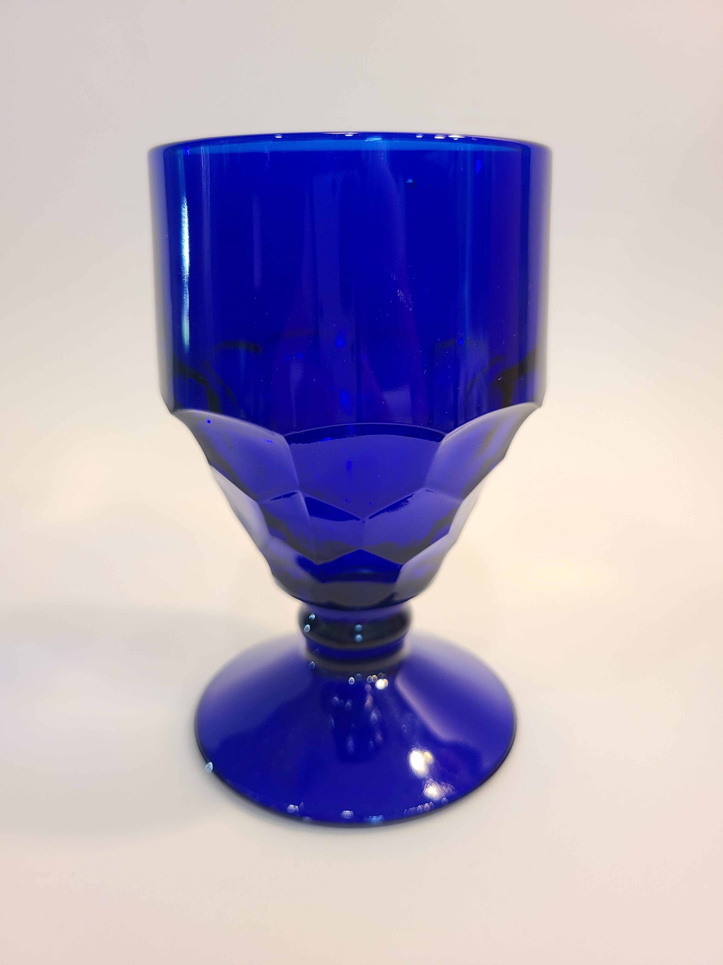 Side view of vintage Viking Glass Georgian Honeycomb Goblet in Cobalt Blue.