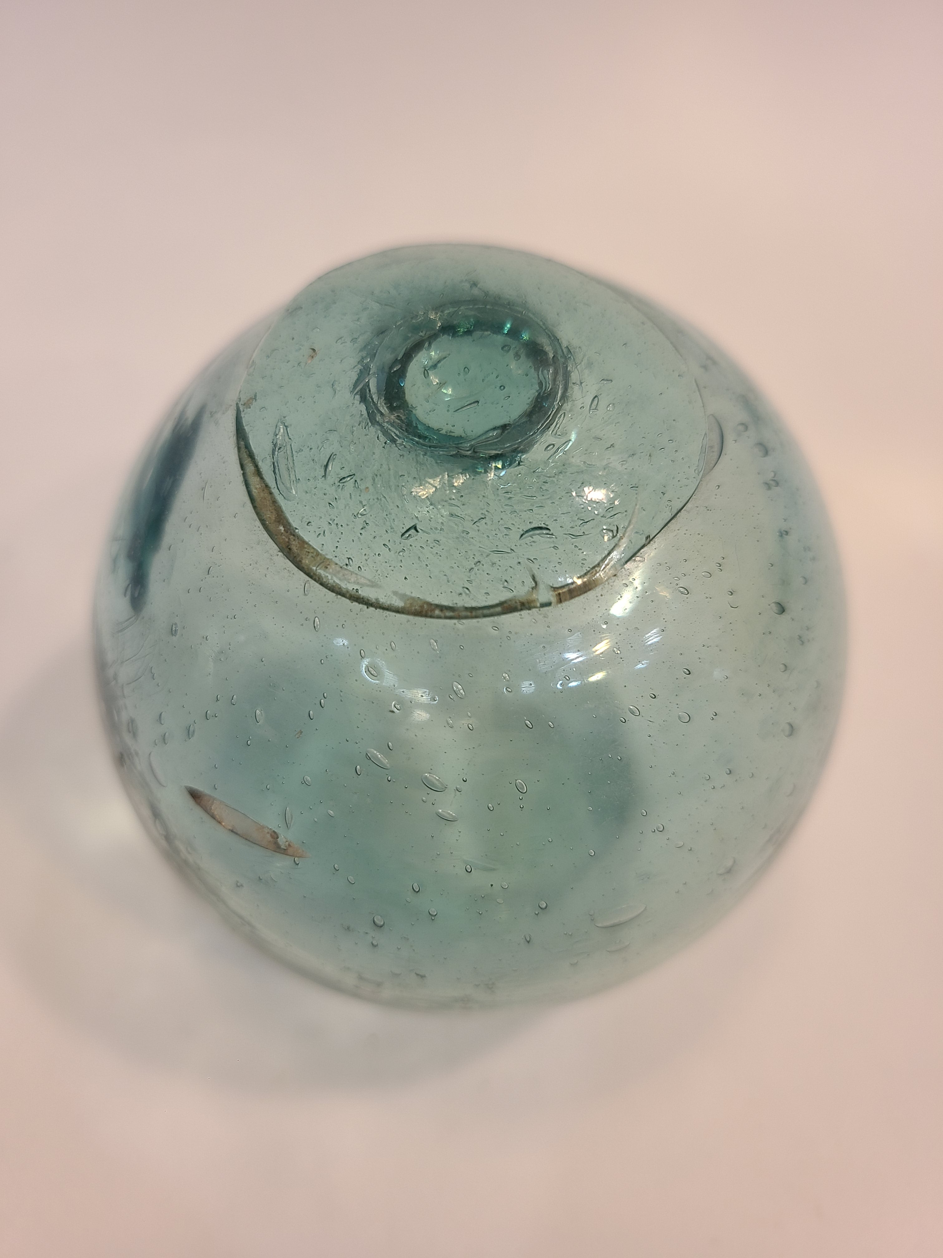 Authentic Glass Fishing Float 3" diameter in classic blue-green color.