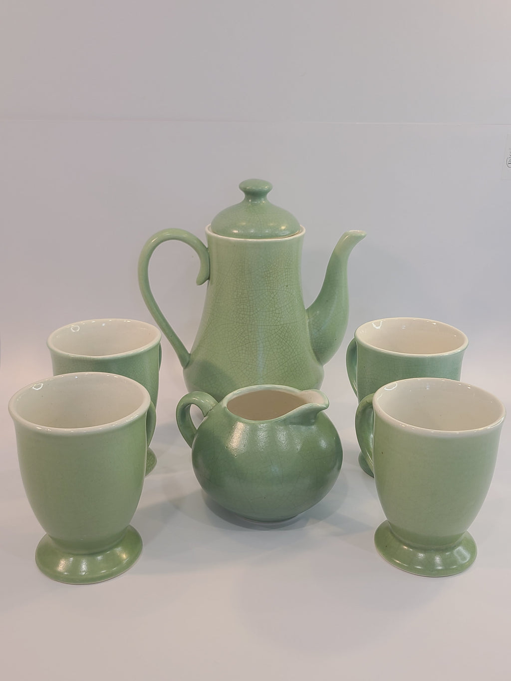 Celadon ceramic Tea or Coffee Service Set Made in Vietnam, set includes Teapot 7.5 inches high, Creamer 3.5 inches high, Mugs 4.5 inches high.