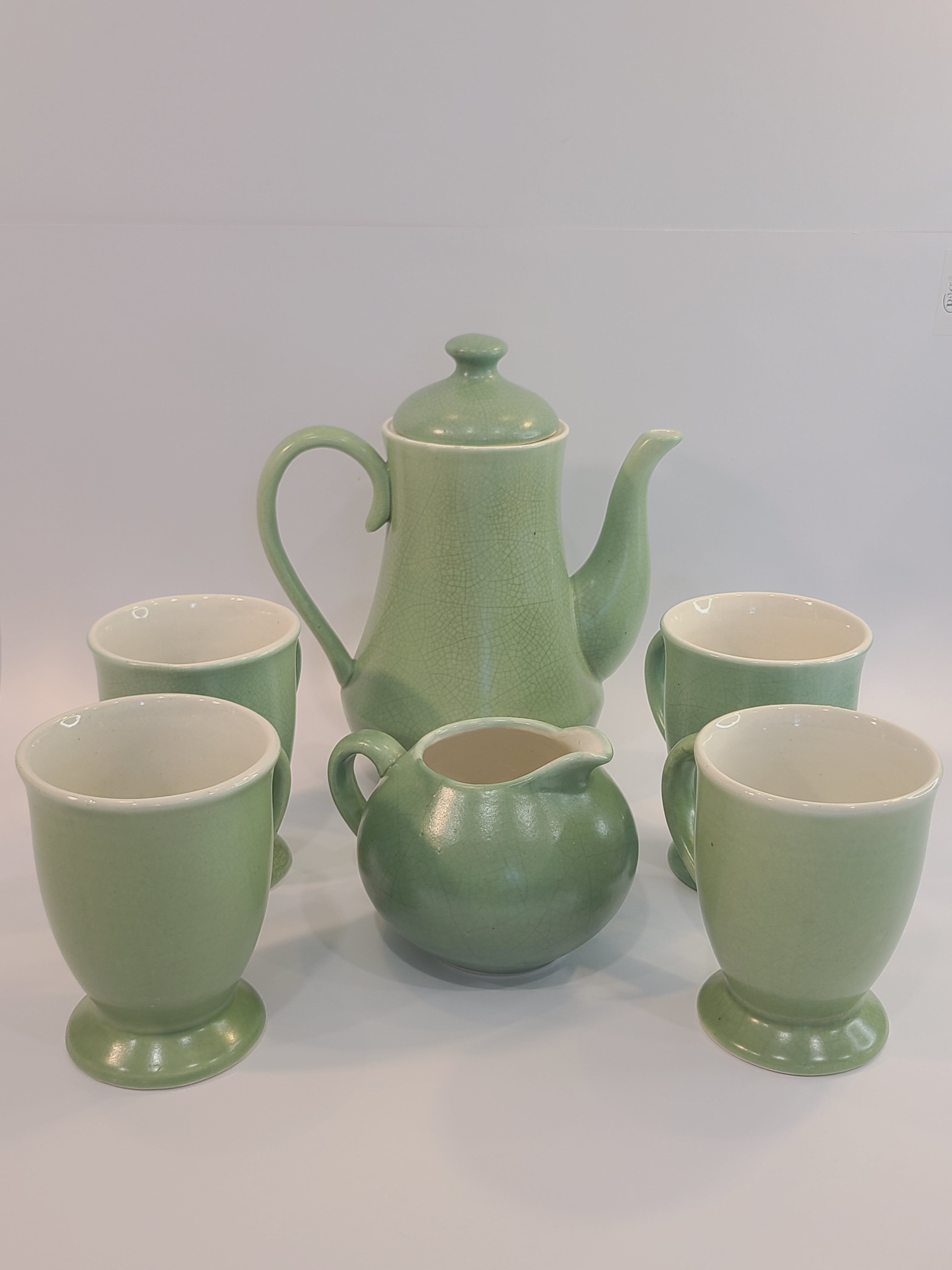 Celadon ceramic Tea or Coffee Service Set Made in Vietnam, set includes Teapot 7.5 inches high, Creamer 3.5 inches high, Mugs 4.5 inches high.
