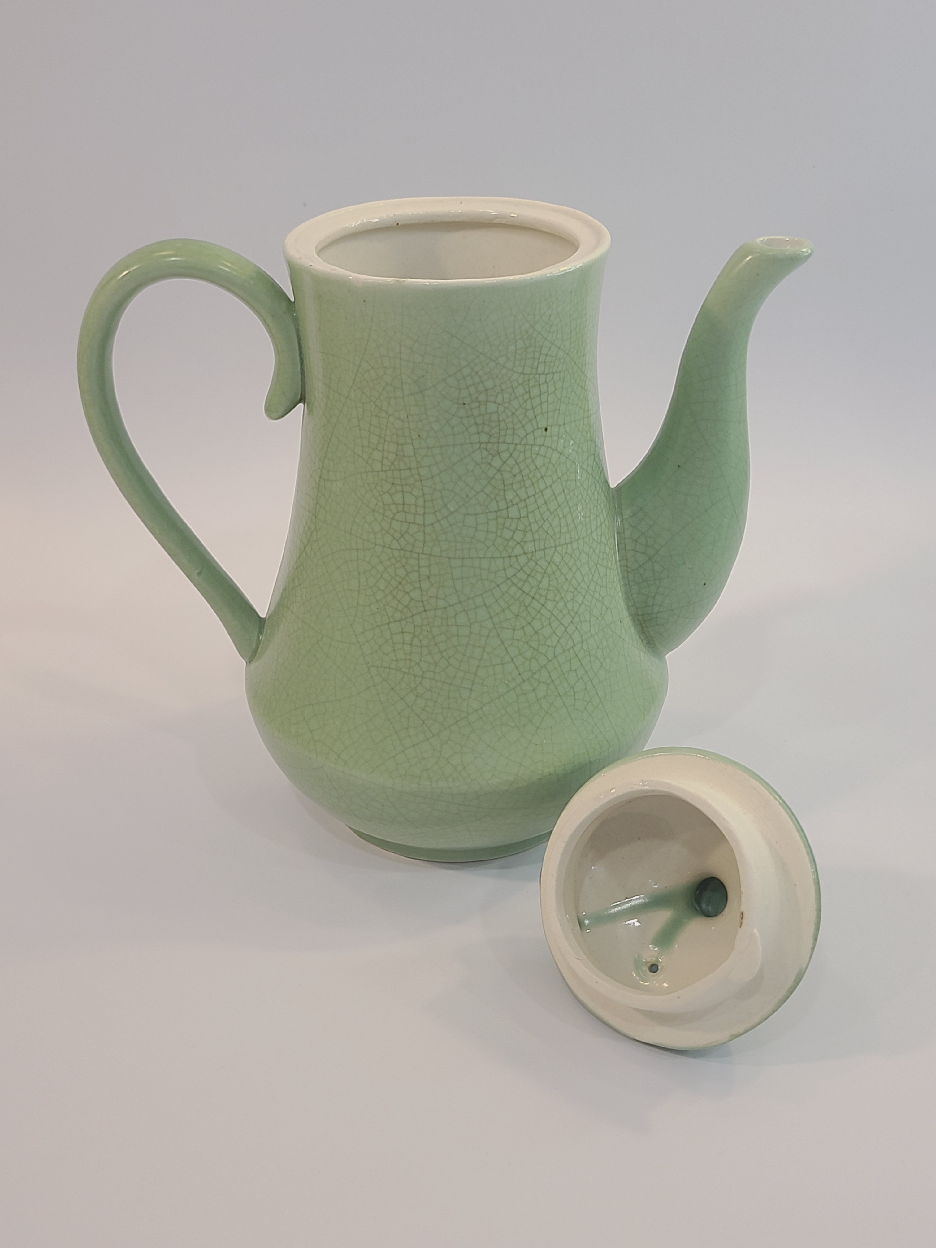 Celadon ceramic Teapot 7.5 inches high shown with lid off, made in Vietnam.