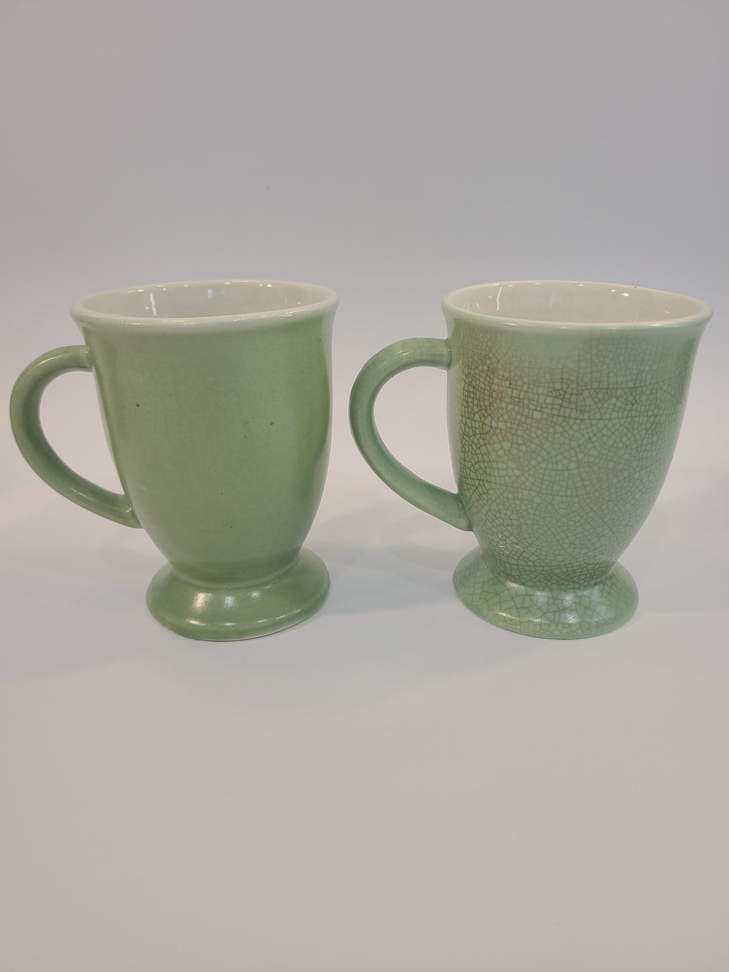 Celadon ceramic mugs 4.5 inches high made in Vietnam.