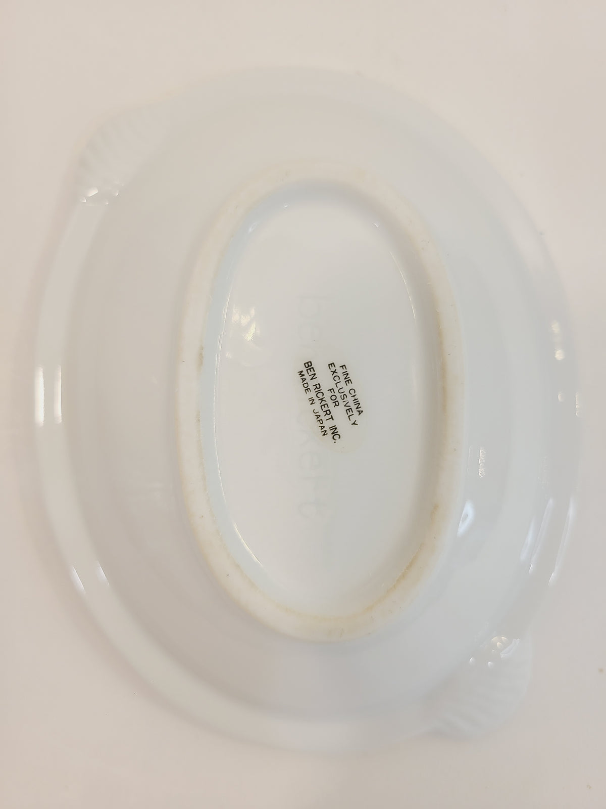 Bottom of Ben Rickert Fine China Dish with Seashell Embossed Rim and aqua and gold trim 1980s