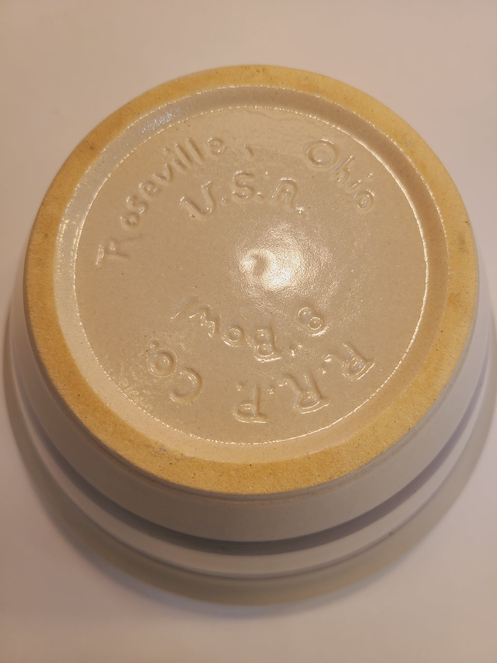 Bottom of RRP Co. stoneware bowl showing embossed maker's mark: Roseville Ohio USA, Robinson Ransbottom Pottery Co.