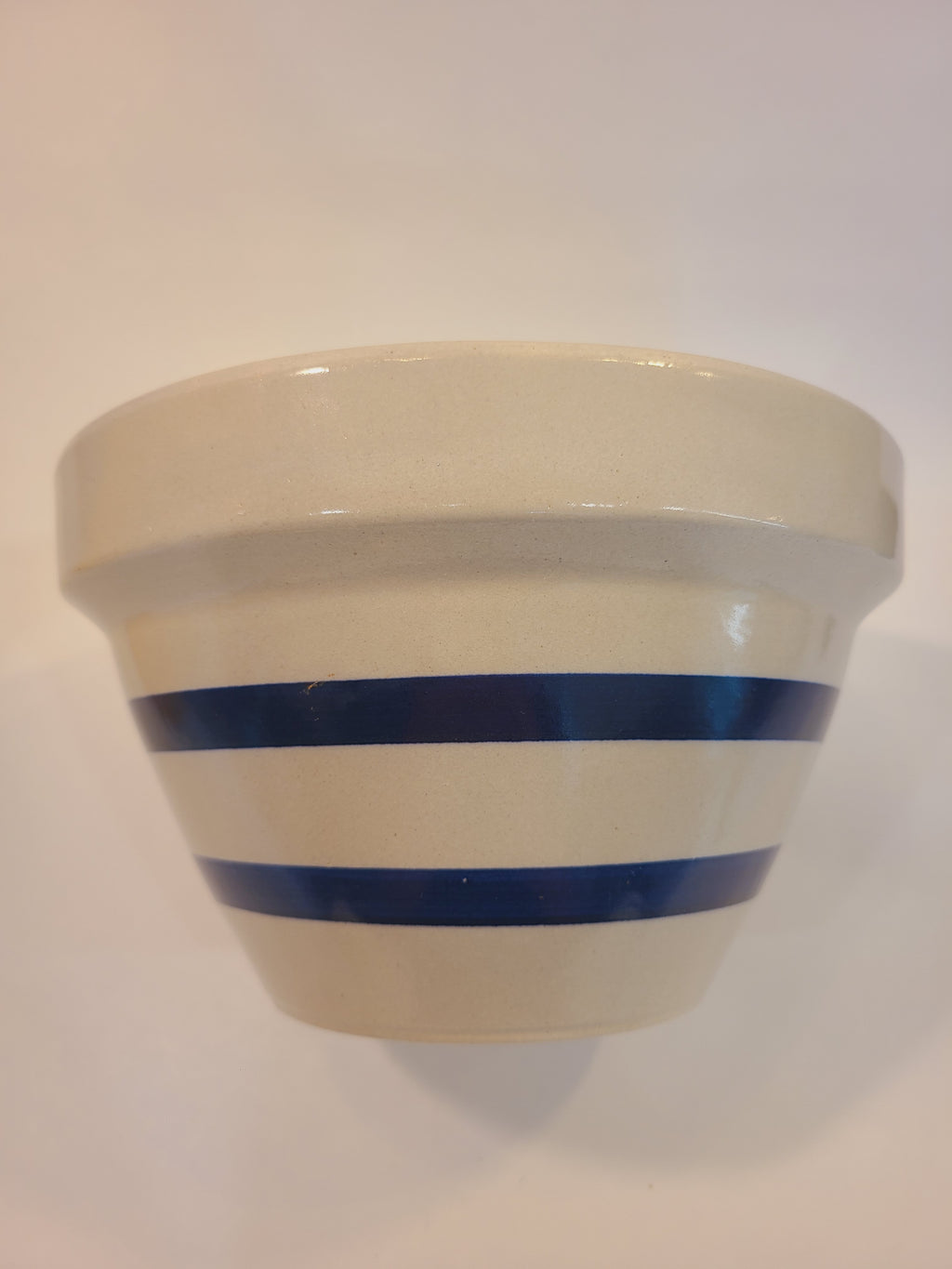 Side view of RRP Co. Robinson Ransbottom stoneware bowl with blue stripe bands, Roseville Ohio USA