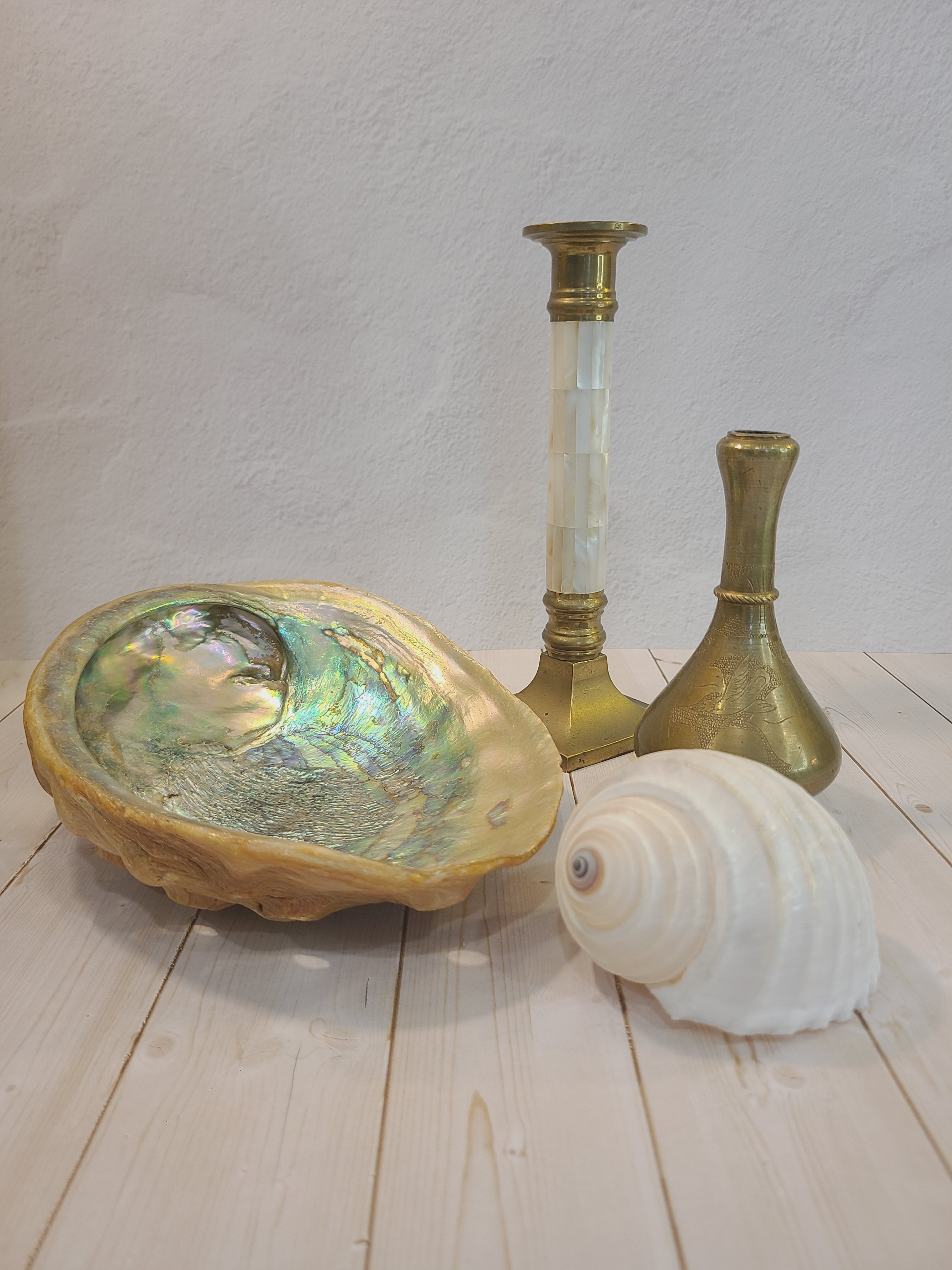 Brass and Mother of Pearl Hollywood Regency Candle Holder 1970s shown with shells and brass vase.