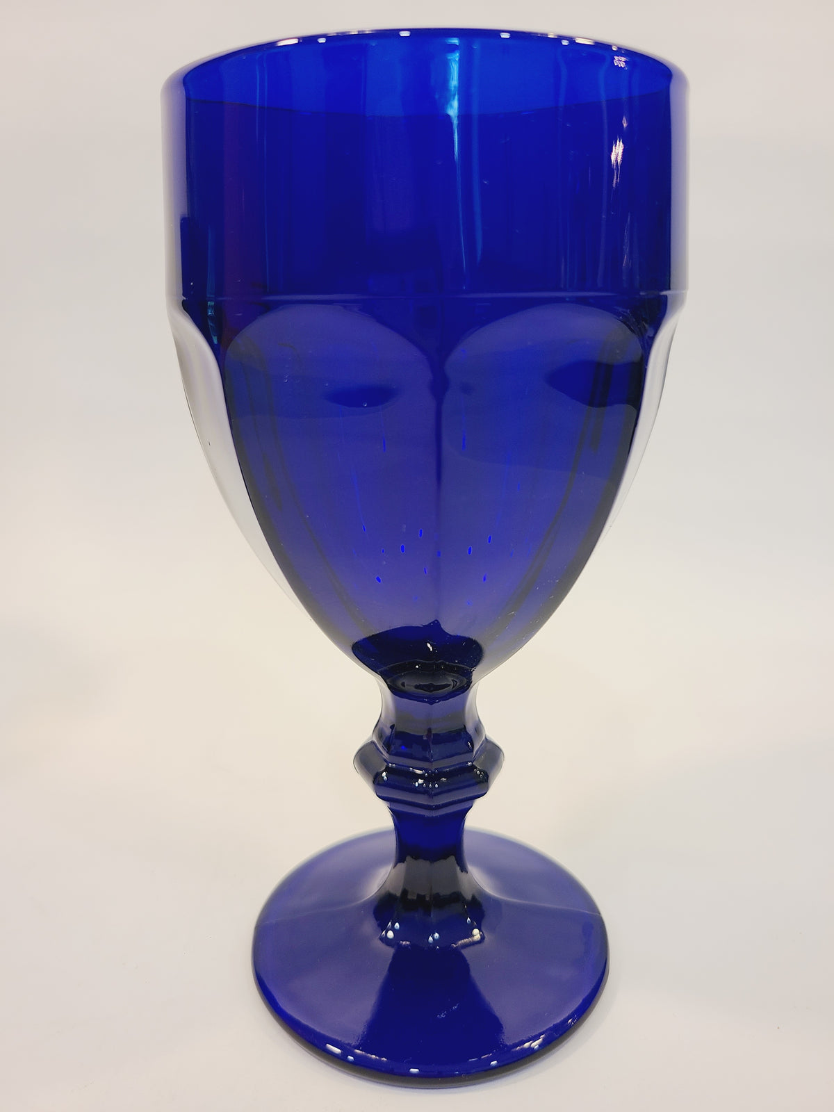 Single Libbey Gibraltar cobalt blue goblet showing deep saturated blue glass and faceted angular bowl, Duratuff USA vintage barware late 1970s–1980s