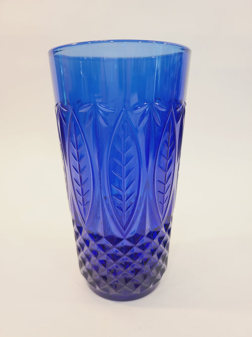 Avon Royal Sapphire cobalt blue highball glass, full view showing embossed leaf and diamond-optic pattern — vintage France