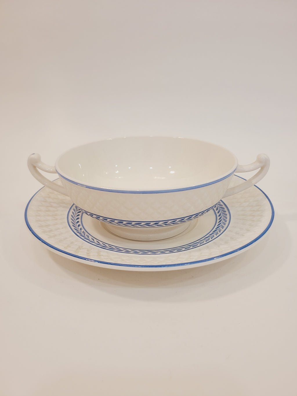 Copeland Spode Elaine cream soup bowl and underplate set, soft blue laurel vine on ivory — Mansard shape, 1939 England