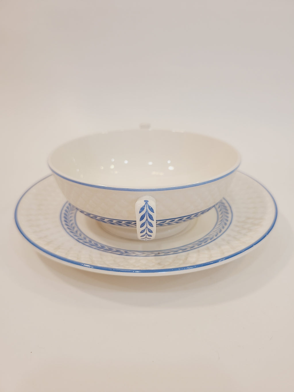 Copeland Spode Elaine Mansard cream soup bowl with two handles on underplate, three-quarter view — antique English creamware 1939