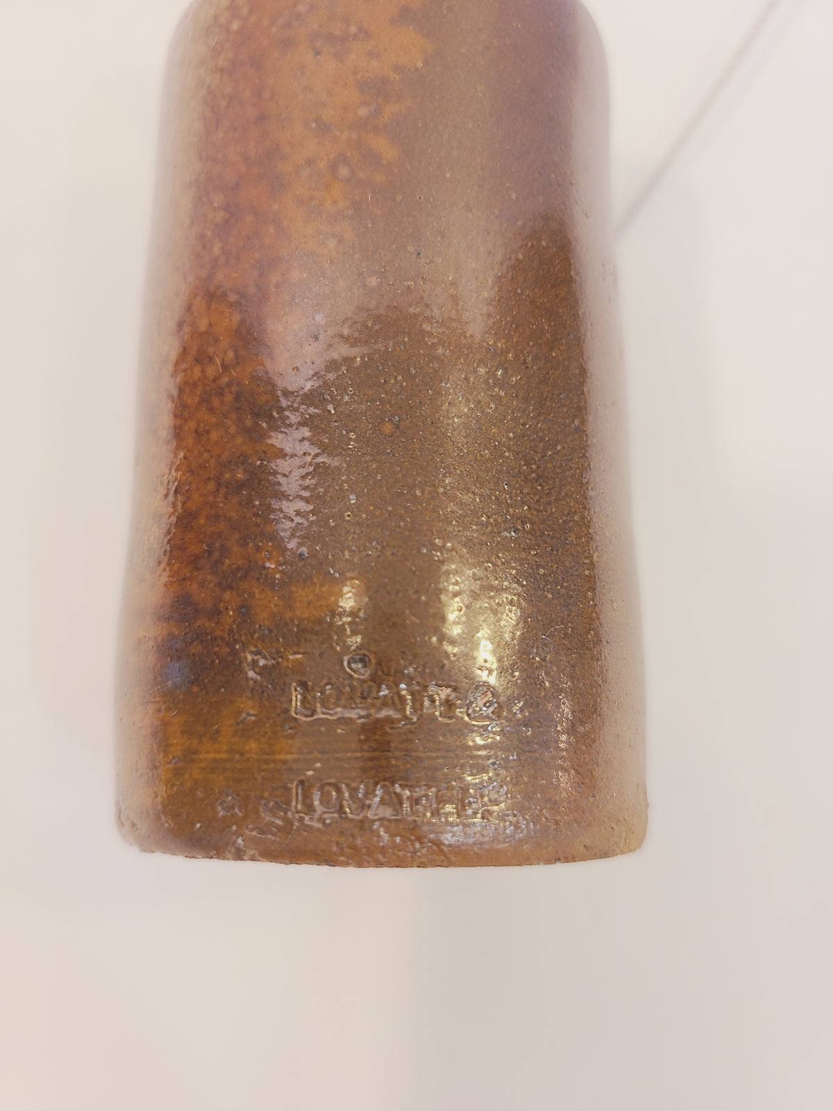Lovatt & Lovatt Ltd Notts Langley Mill maker's stamp on antique salt-glazed stoneware ink bottle, produced 1913–1930
