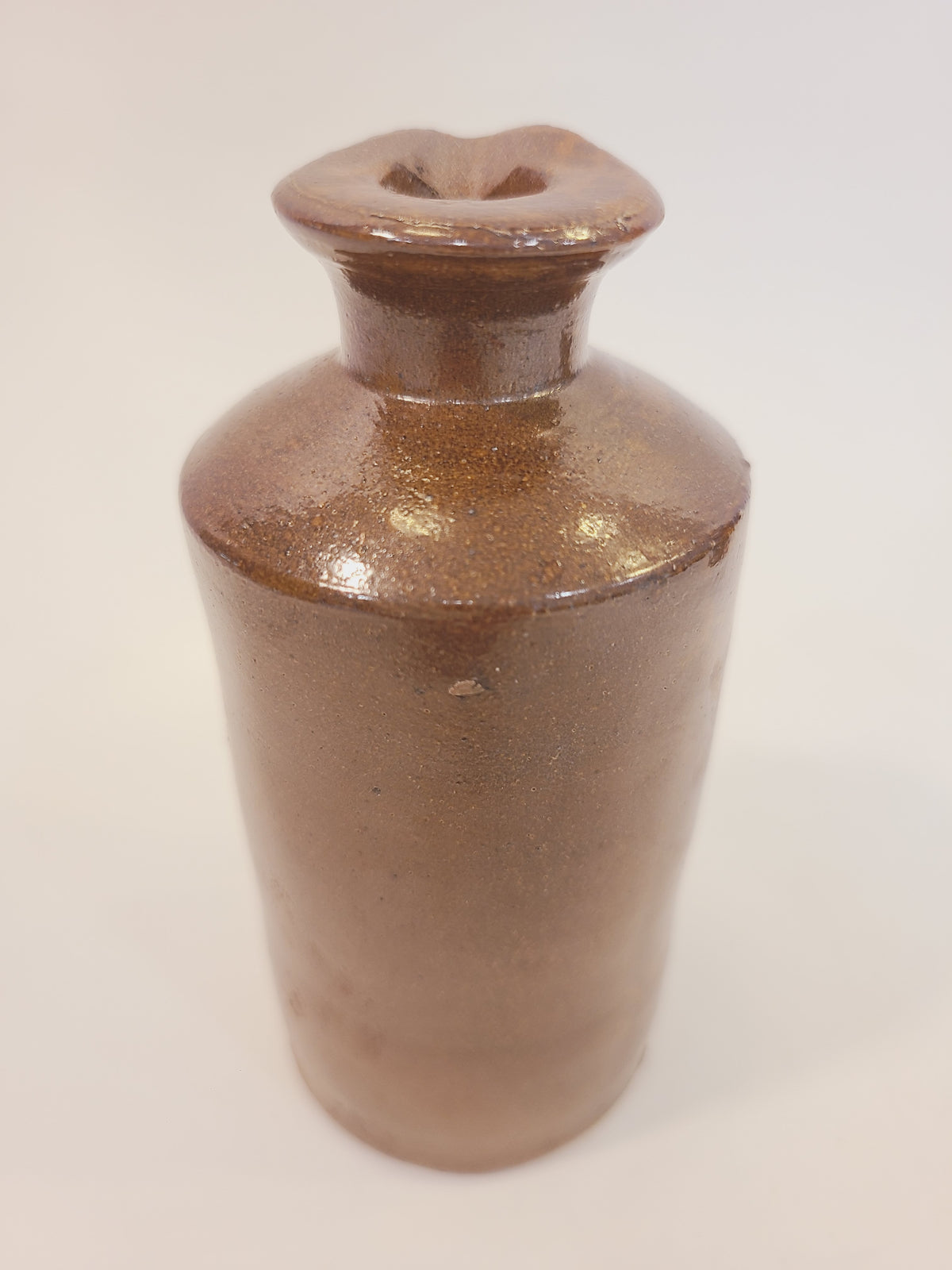 Antique English salt-glazed stoneware ink bottle, Lovatt & Lovatt Langley Mill — rustic ginger-brown glaze, circa 1913–1930