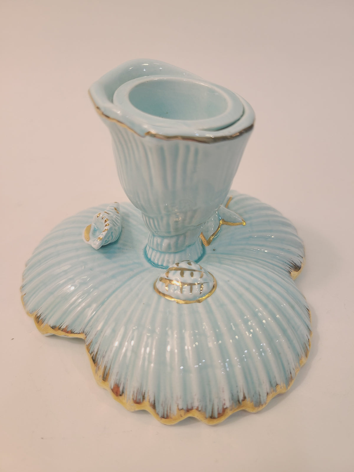 NAPCO Tropic Sea mid-century ceramic candle holder, aqua glaze with gold gilt trim, scalloped shell base, front view