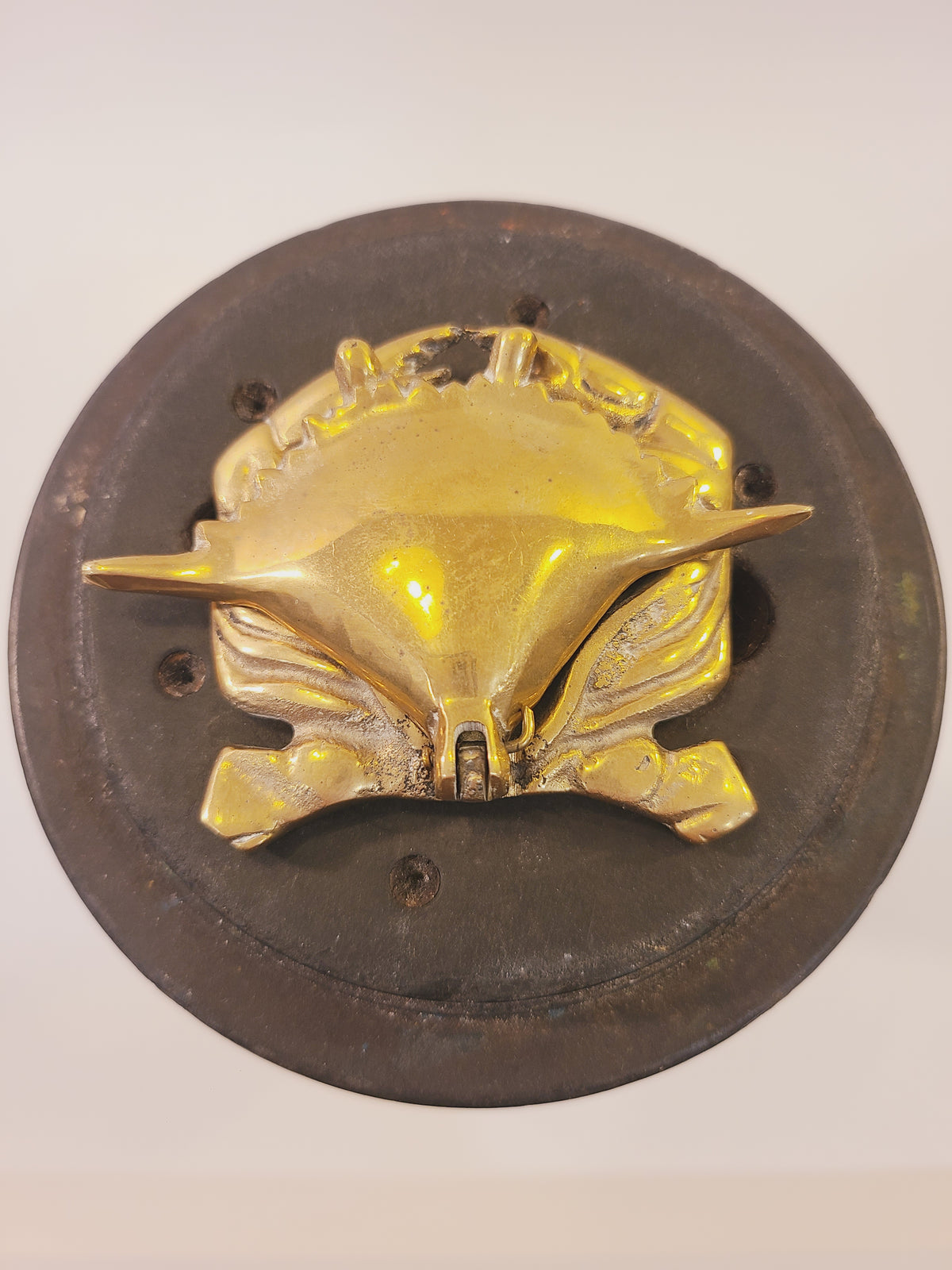 Top view of a solid brass crab trinket box with detailed claws, legs, and shell