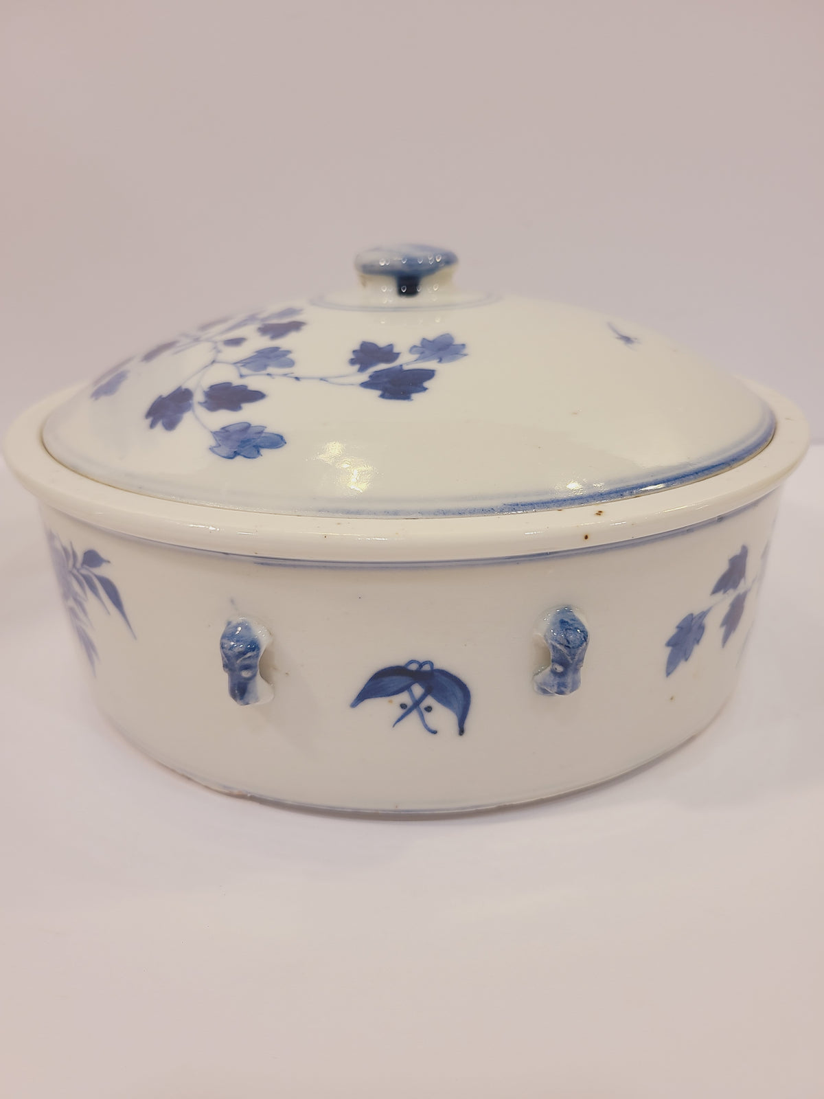 East Asia lidded blue and white porcelain bowl side view showing small handles